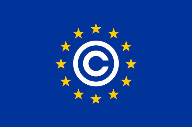 A copyright symbol surrounded by yellow stars on a blue background
