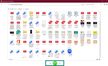 Click the green Restore button to restore files using Windows File History.